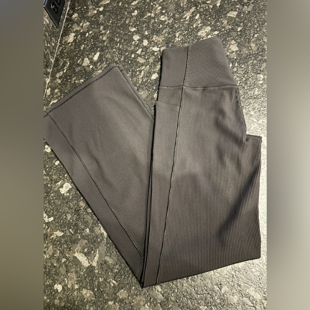 Athleta Salutation Stash Flare Black Pant Size Small